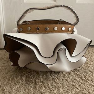 Zara white ruffle bag with chain.